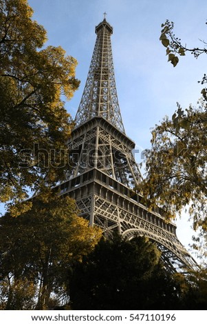 Eiffel Tower from the bottom, during a sunny day in autumn, Paris, France