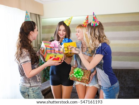 Beautiful girls give a gift to his girlfriend's birthday.