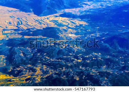 Airplane view on mountain from above