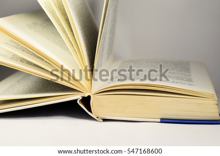 An open book isolated on a white background