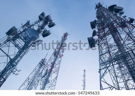 telecommunication  mast TV antennas wireless technology with blue sky in the morning Royalty-Free Stock Photo #547249633