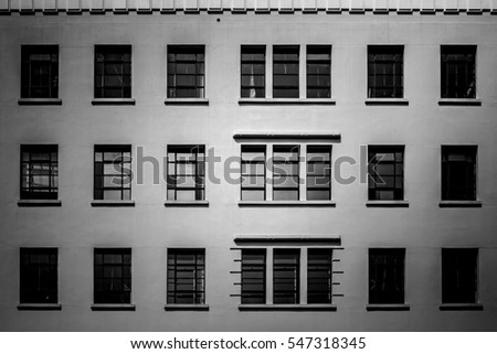 windows of  commercial building with B&W color