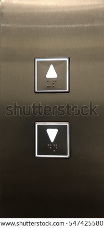 Button up and down in front of elevator support people with disability
