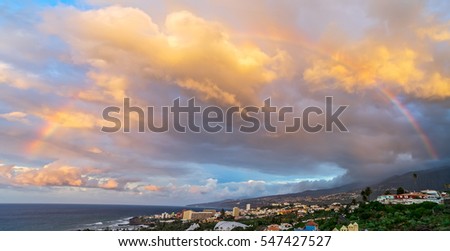 Rainbow in sky, tropical sunset on Tenerife, Canarias Spain
