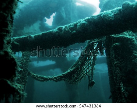 Sunked ship underwater (detail)                                Royalty-Free Stock Photo #547431364