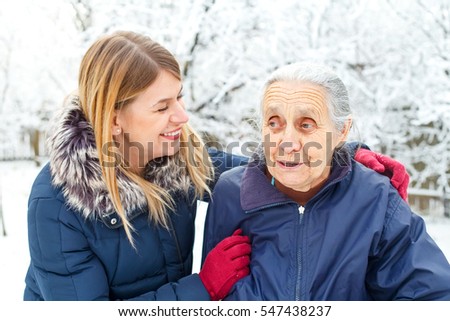 Picture of a young woman speding time with her grandmother