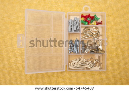 Picture Hanging Supplies a Vibrant Yellow Background.