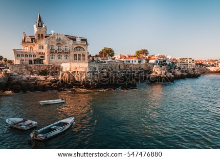 Sea view of a beautiful town Cascais in Portugal  Royalty-Free Stock Photo #547476880