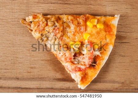 Fresh pizza with cheese on wood desk. Food background