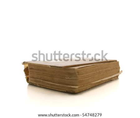 A very well read old book isolated on white
