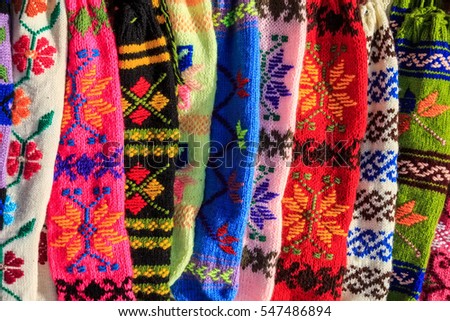 Bunch of handmade colorful woolen socks