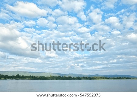 Clound and sky with the river at moutain background.
