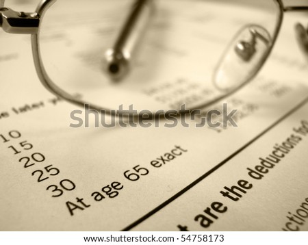 Retirement image of pension plan form with glasses and pen Royalty-Free Stock Photo #54758173