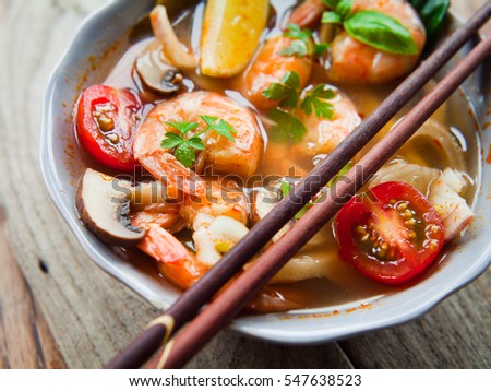 Tom yum goong nam sai  -  clear stock broth version of Famous Thai soup with prawns