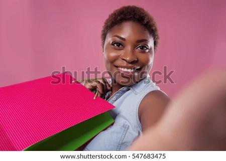 selfie African American on a pink background