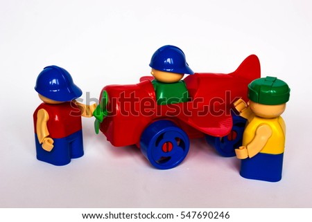 Toy plane and men on white background