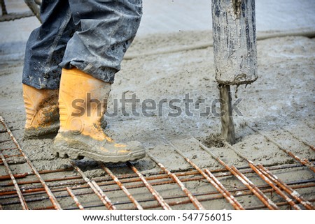 construction site pouring concrete Royalty-Free Stock Photo #547756015