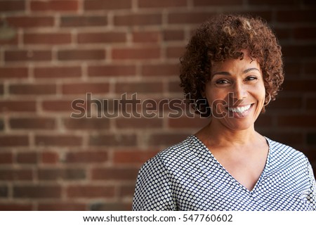 Head And Shoulders Portrait Of Mature Businesswoman Royalty-Free Stock Photo #547760602