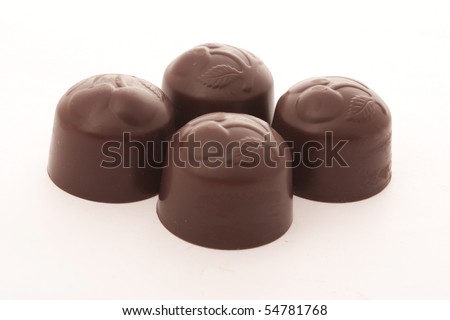 chocolate candies isolated over white