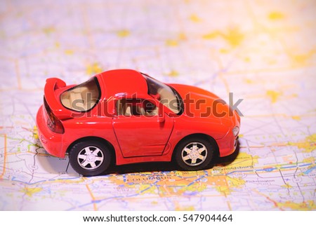 Close up car toy on the map / Selective focus