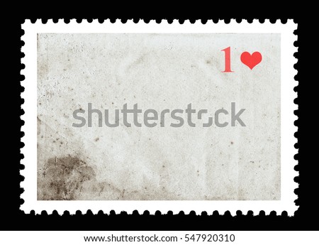 Vintage blank postage stamp and one red heart on a black background. Valentine's Day. Royalty-Free Stock Photo #547920310