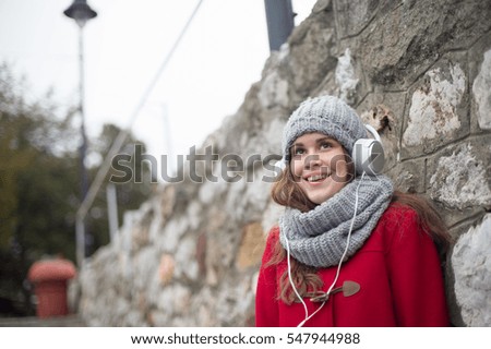 Young Beautiful female student  in the city