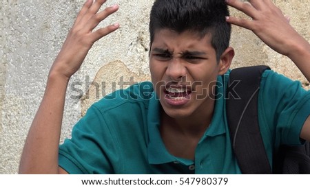Angry Teen Boy Royalty-Free Stock Photo #547980379