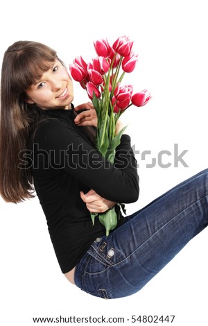 Smiling girl with flowers on a white background