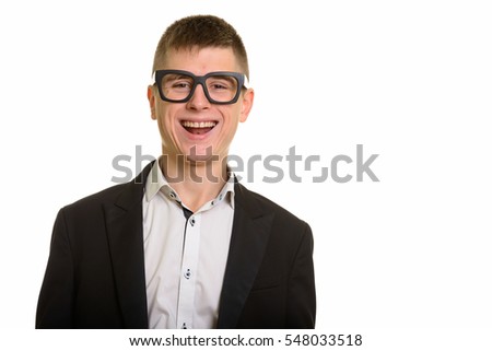 Studio shot of young happy businessman smiling and laughing isolated against white background