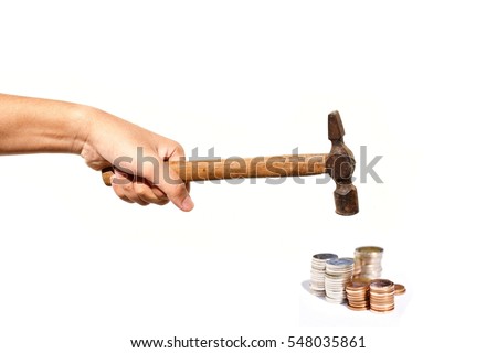 Raise the Hammer to smash coin stack isolated on white background, Hammered down,Business and finance 