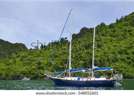 landscape Yacht boat on sea green island background