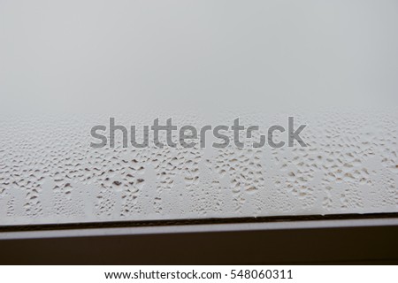 Drops of rain on the window. Rainy weather