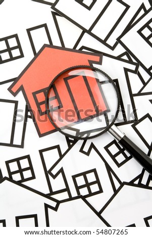 home sign and Magnifying Glass , Real Estate Concept