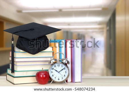 very blurry school hall background and book for education concept