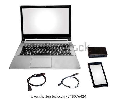 Laptop computer smart phone card reader and data cables chord isolated in white.
