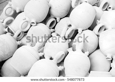 Handmade clay jugs, detail of some old clay pots, tradition and decoration, pottery