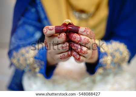 unique bride hand with henna and ring. close up