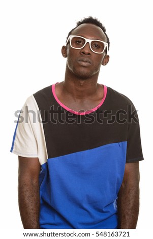 Young black African man looking tired isolated against white background