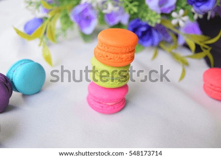 Macaroon color and splendor,Sweets laid on a white cloth