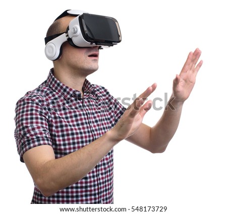 man in virtual reality through a VR headset. isolated on white background