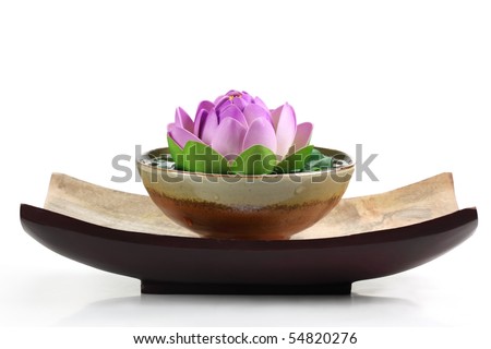 Spa objects with lotus flower and bowl