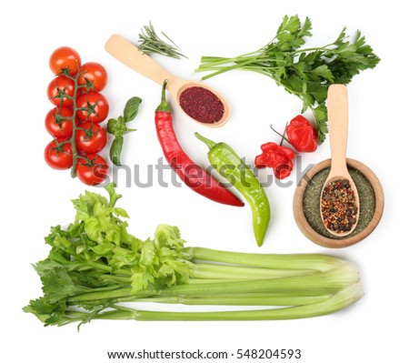 Spice, vegetables and herbs on white background Royalty-Free Stock Photo #548204593