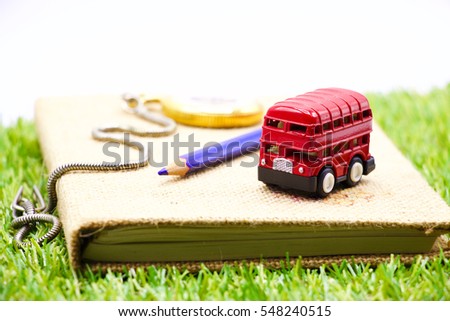 Memory of London, England , red double deck bus and diary on white background.