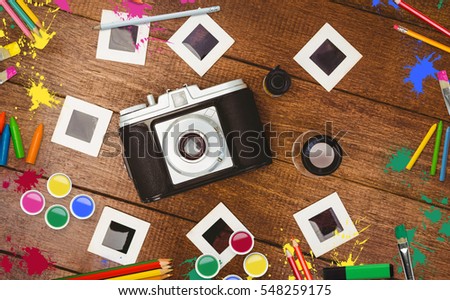 Frame of art supply against camera with transfer print on table
