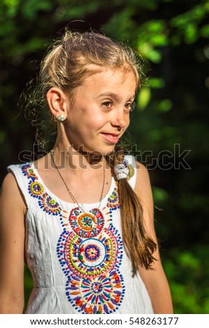 Portrait of beautiful girl in the Park