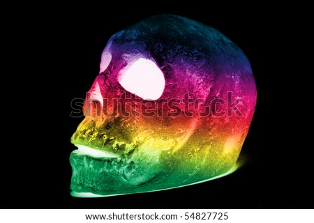 colorful skull against black background