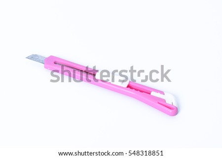Colorful plastic Cutter isolated on white background
