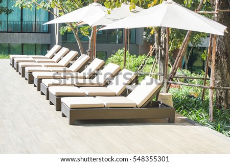 Relaxing Rattan Sofa At Swimming Pool for hotel or resort outdoor background