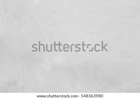 White concrete wall,Natural cement wall texture or old stone,retro-background wall texture. Concrete background gray suitable for use in classic design. Concrete loft style design ideas living home.  Royalty-Free Stock Photo #548363980