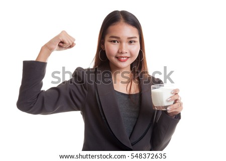 Healthy Asian woman drinking a glass of milk  isolated on white background.